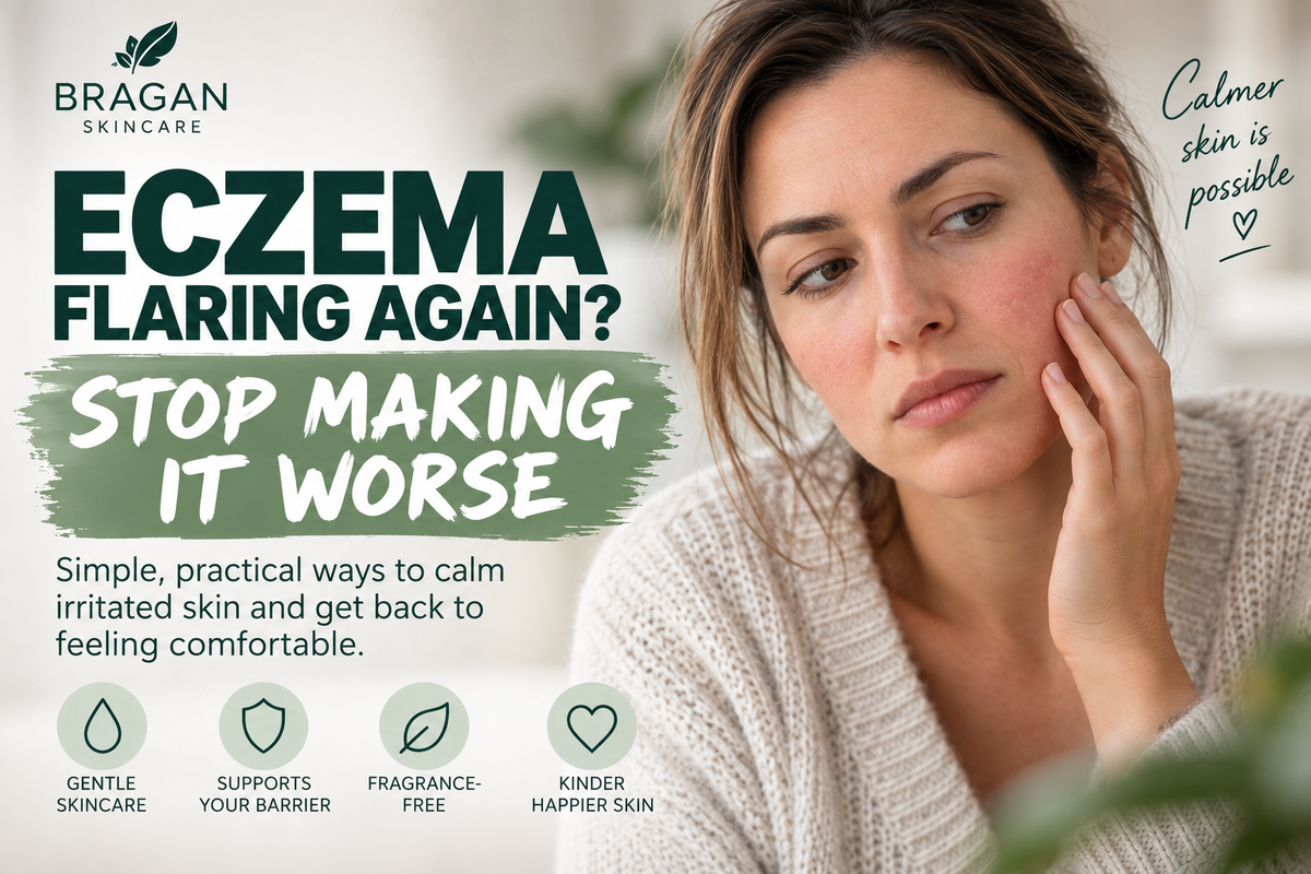 Woman gently touching mildly irritated eczema-prone skin on her cheek during a flare-up