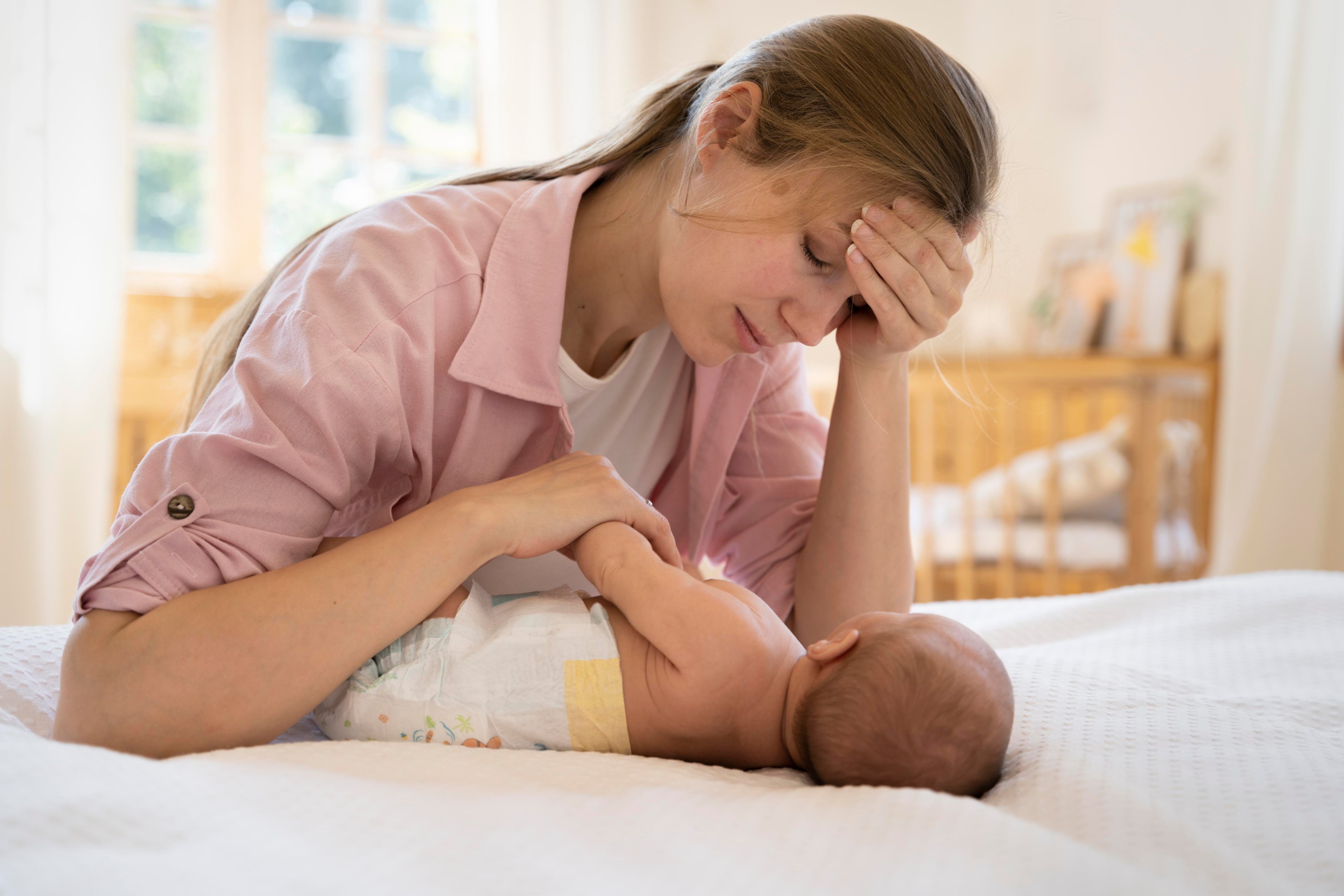 mother and her baby with eczema