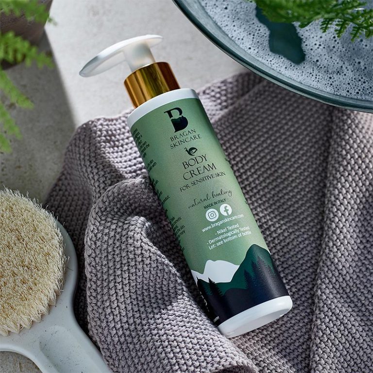 Bragan Skincare's body cream sitting on a grey towel